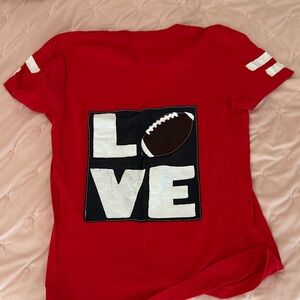 Football T size medium (runs small) Graphic T-Shirt